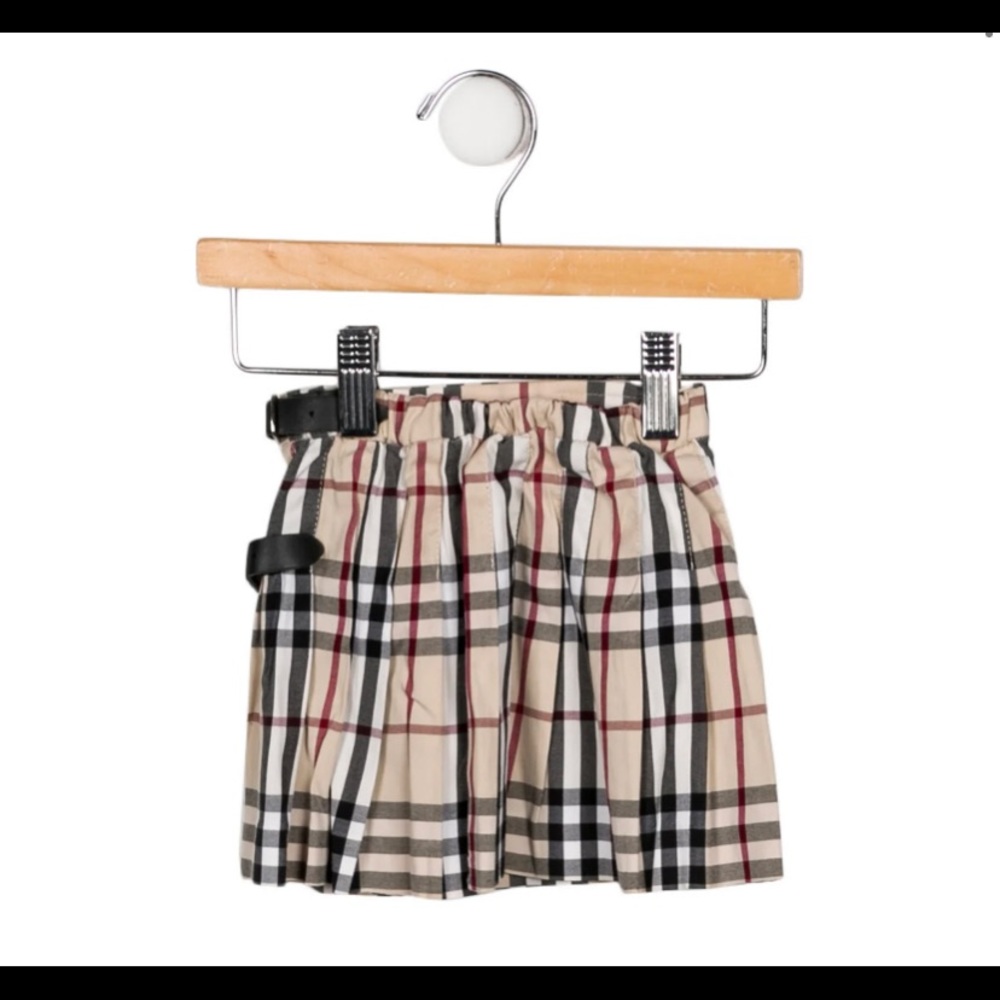 Beige black, white and red Burberry pleated skirt dual leather buckle closures